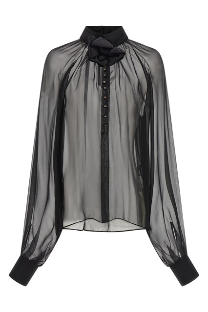Blusa in chiffon con fiore